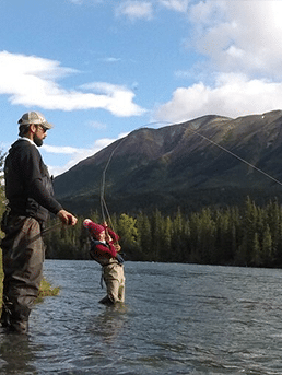 Father and son fly fishing